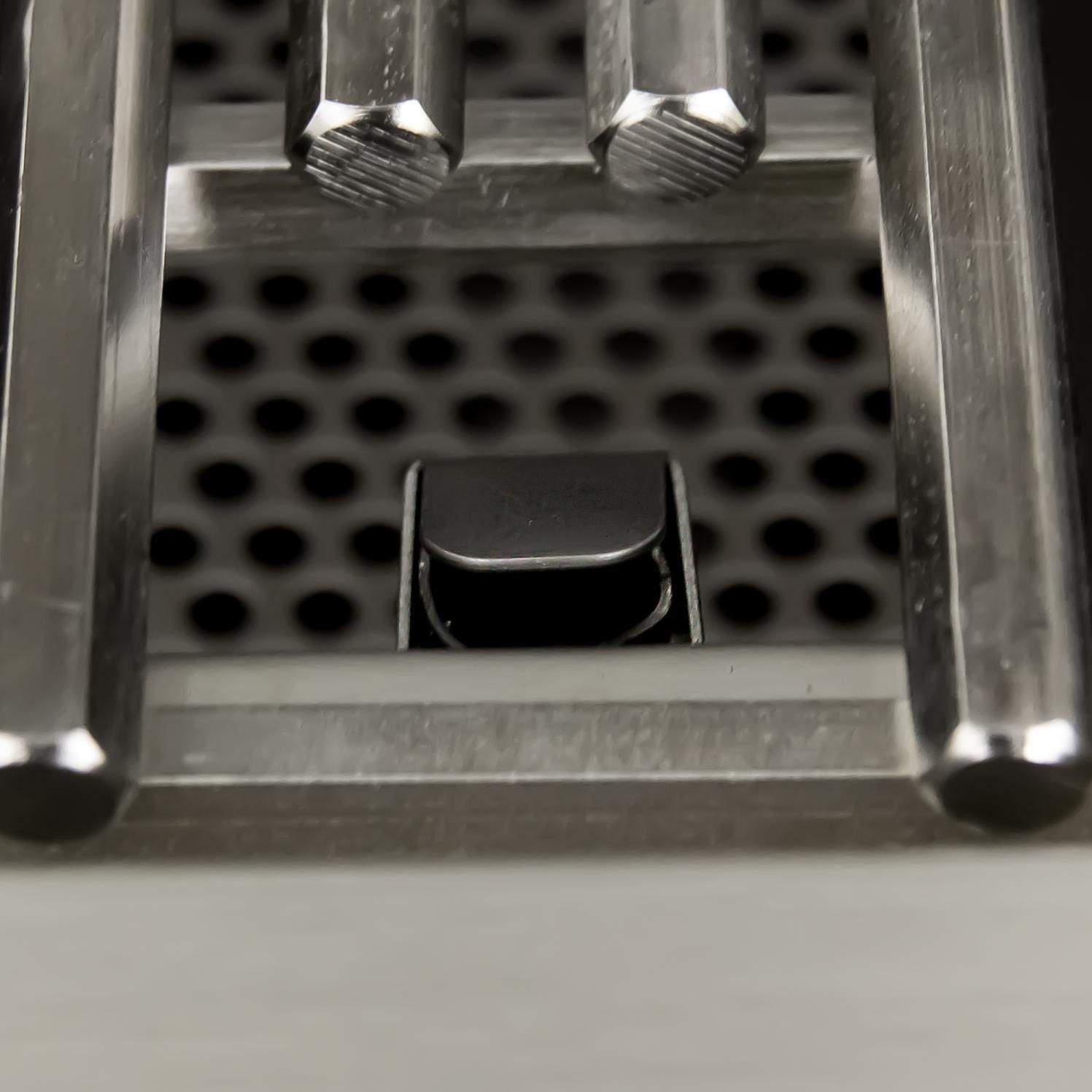 Gas grill burner tray with perforated holes and center burner cover