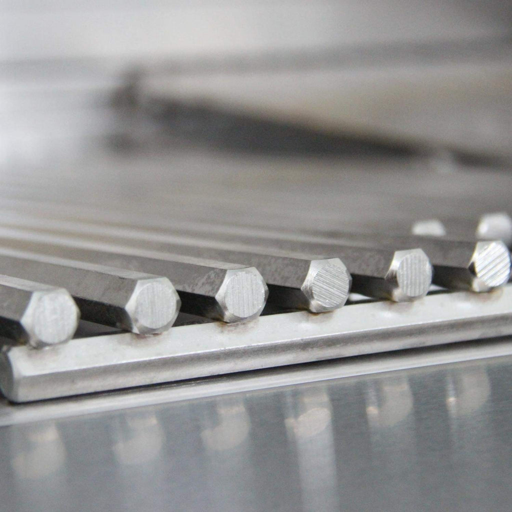 Stainless steel grill burner row with multiple round flame ports