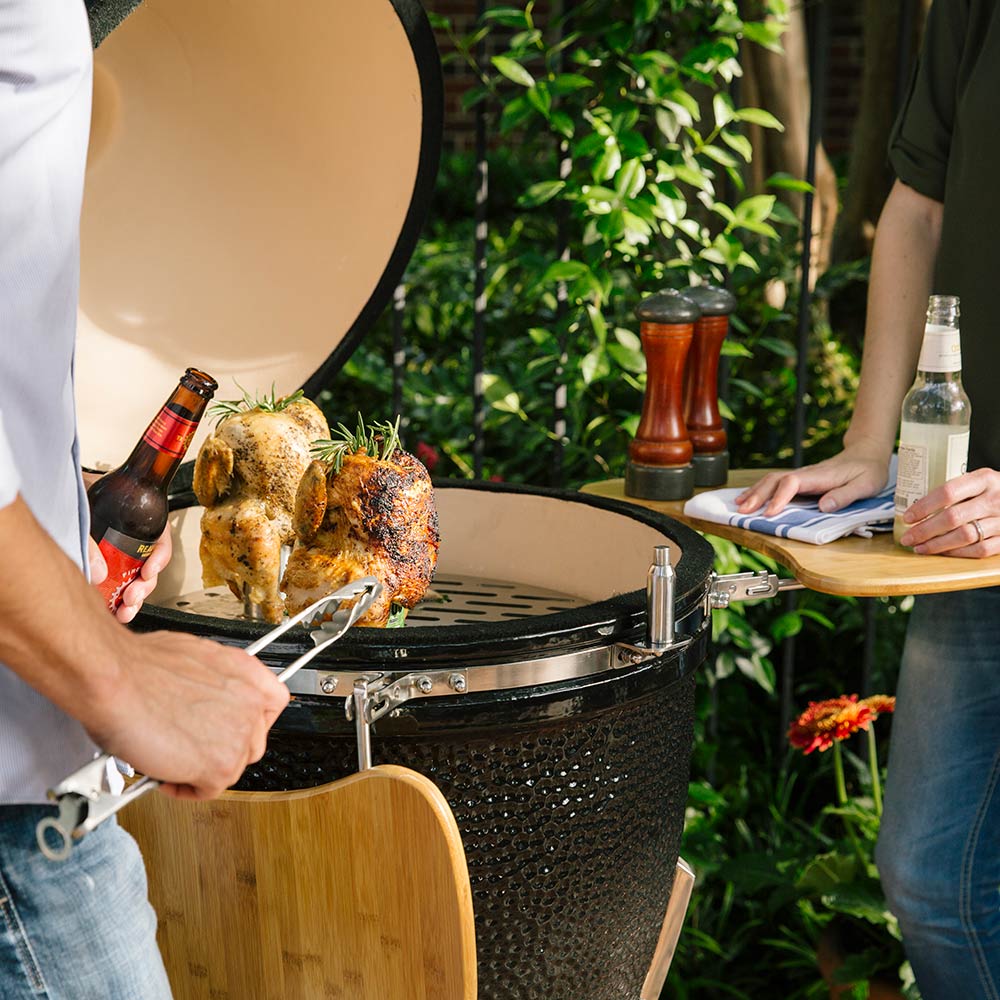 Coyote Ceramic Asado Smoker with Wheeled Stand & Side Shelves