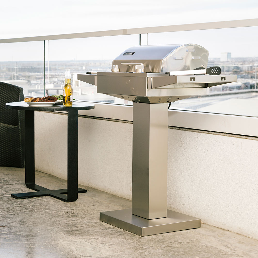 Stainless steel electric grill pedestal with closed lid and side shelves