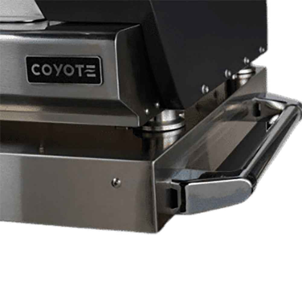Pizza oven cart base close-up showing control panel and Coyote logo with side handle