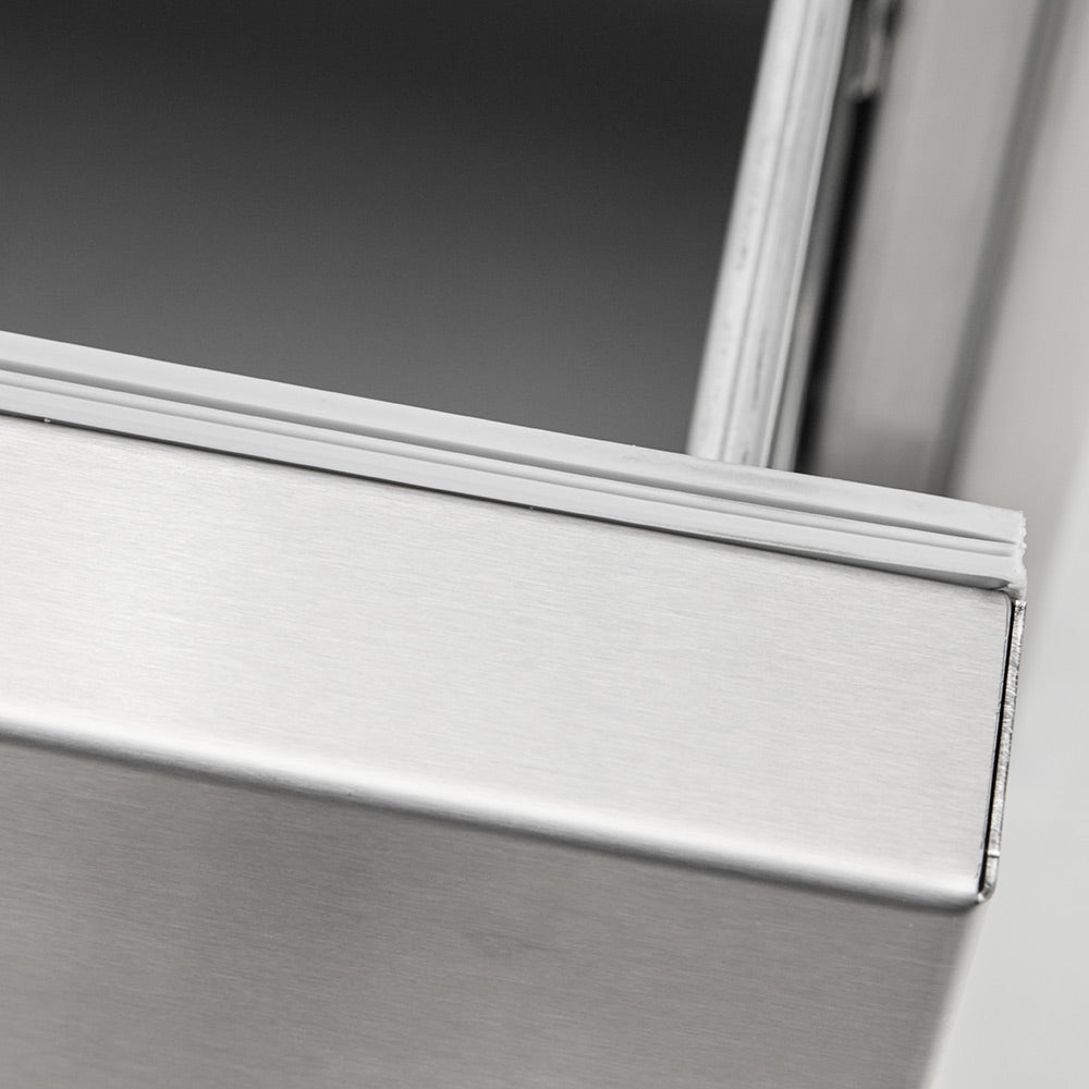 Stainless steel drawer front with brushed finish and slim trim edge