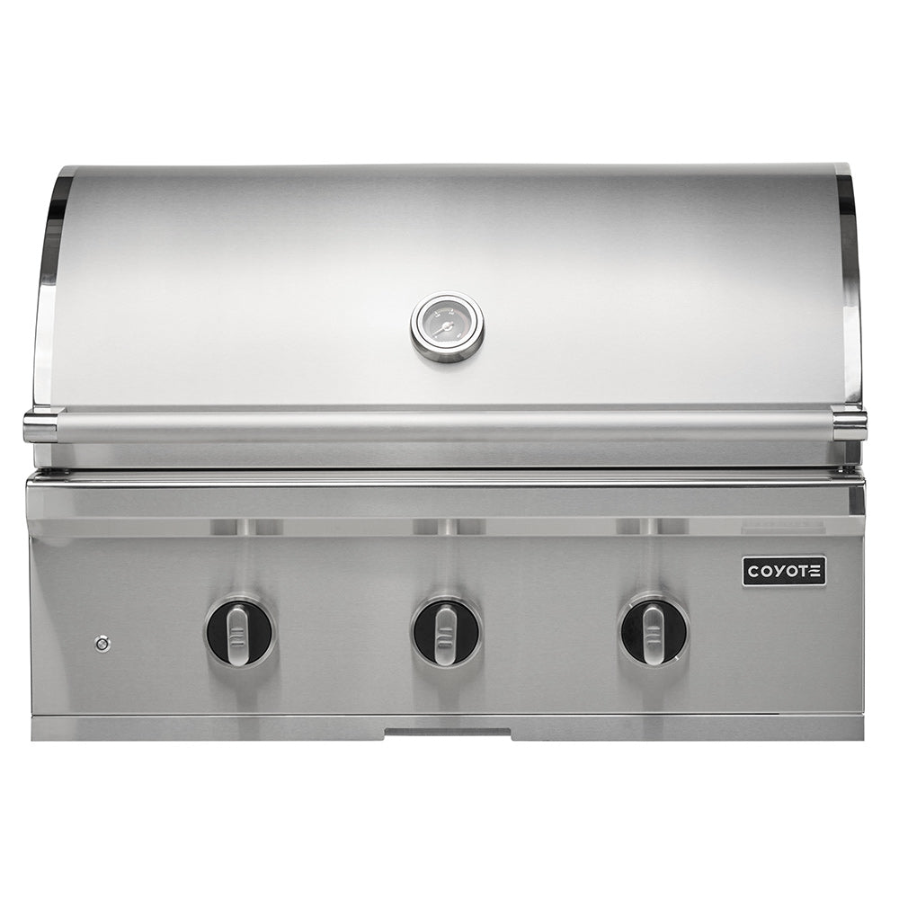 Built-in gas grill lid and control panel in stainless steel with Coyote logo