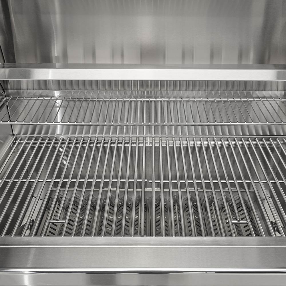 Stainless steel cooking grates inside an open charcoal grill