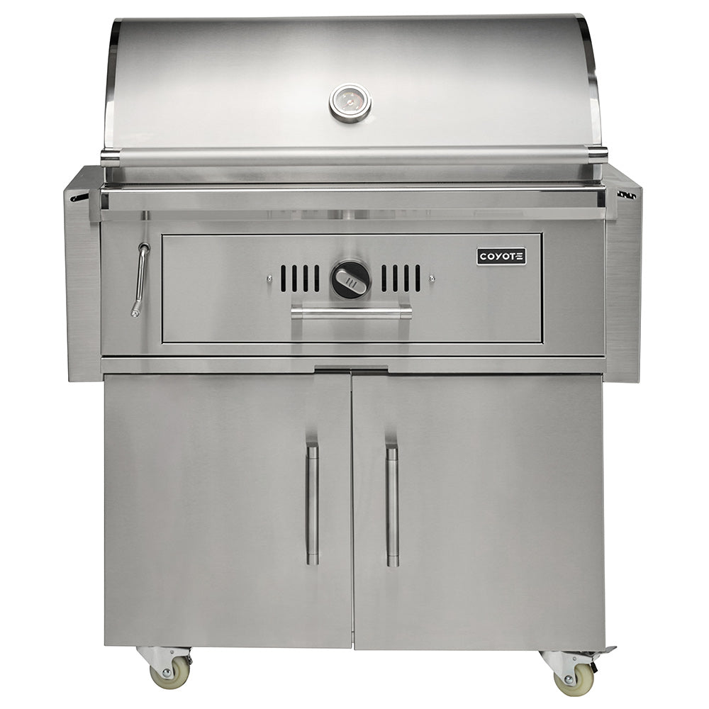 Freestanding stainless steel charcoal grill with hood and front control panel
