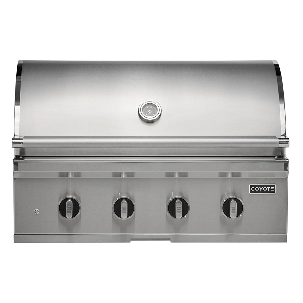 Stainless steel built-in gas grill front with four control knobs and Coyote badge