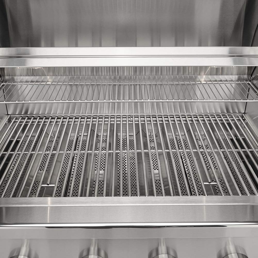 Stainless steel grill grates with parallel cooking slots under the open hood