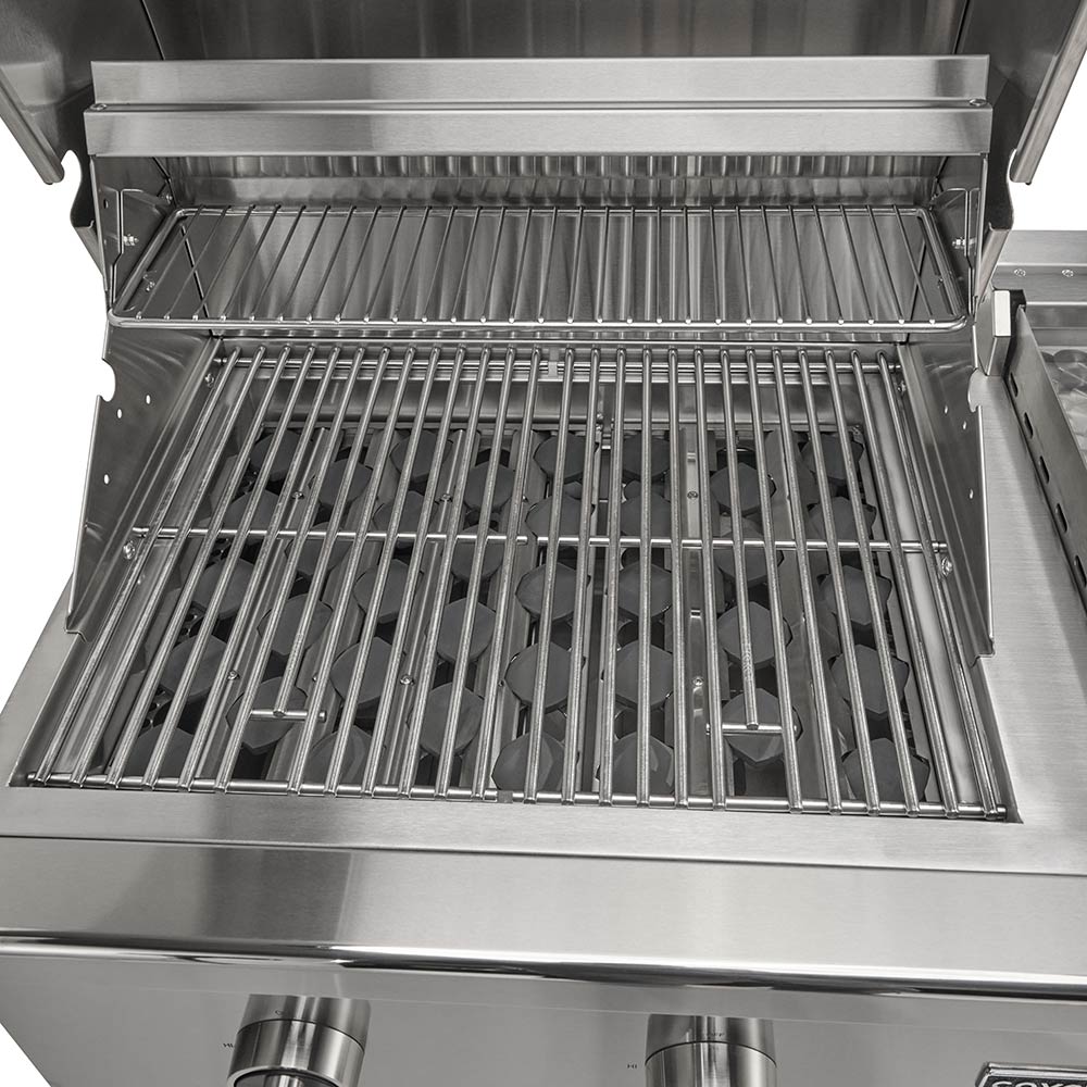 Stainless steel cooking grates inside combo grill, open lid