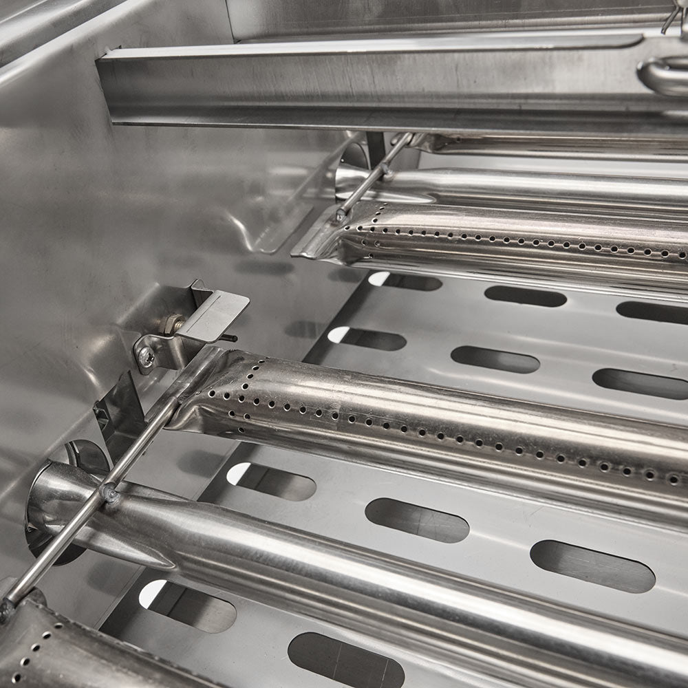 Stainless steel burner tubes and perforated heat shields inside grill chamber