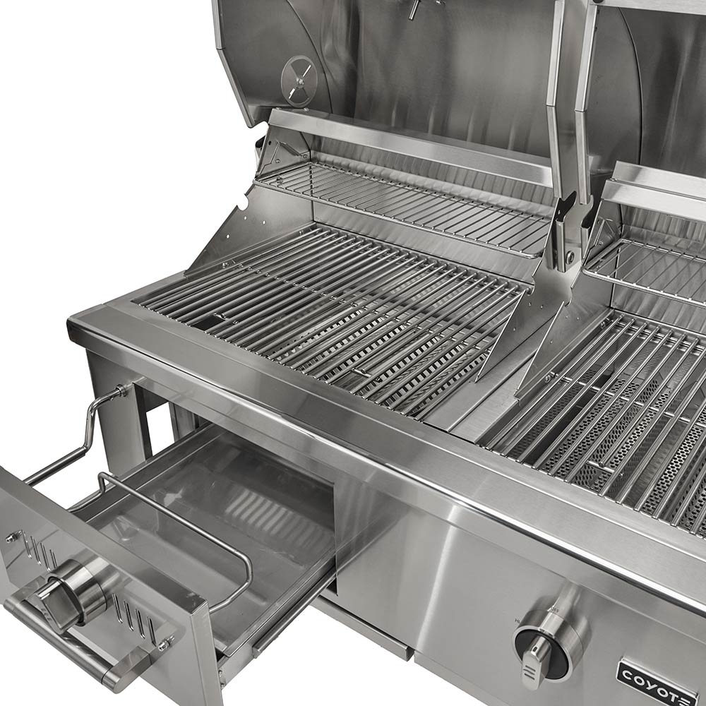 Open stainless steel grill with wire cooking grates and side shelf