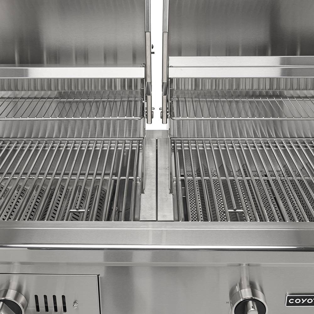 Coyote stainless steel grill interior with center divider and two grate areas