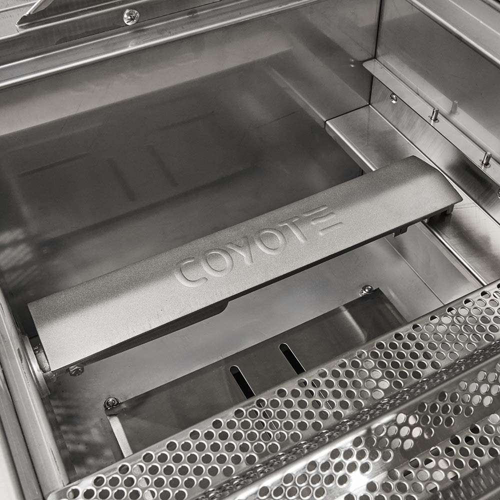 Coyote stainless steel warming drawer with embossed logo and perforated vented panel