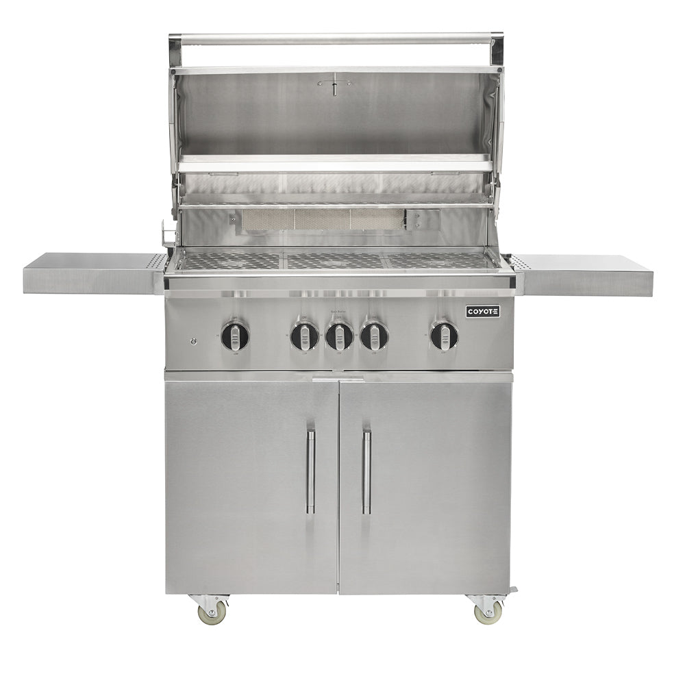 Open stainless steel gas grill with hood raised, burners, and control panel