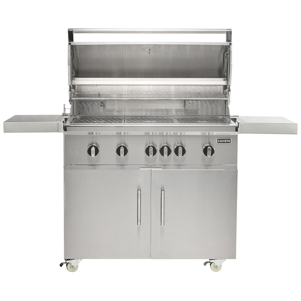 Open stainless steel gas grill with grates, burner controls, and side shelves