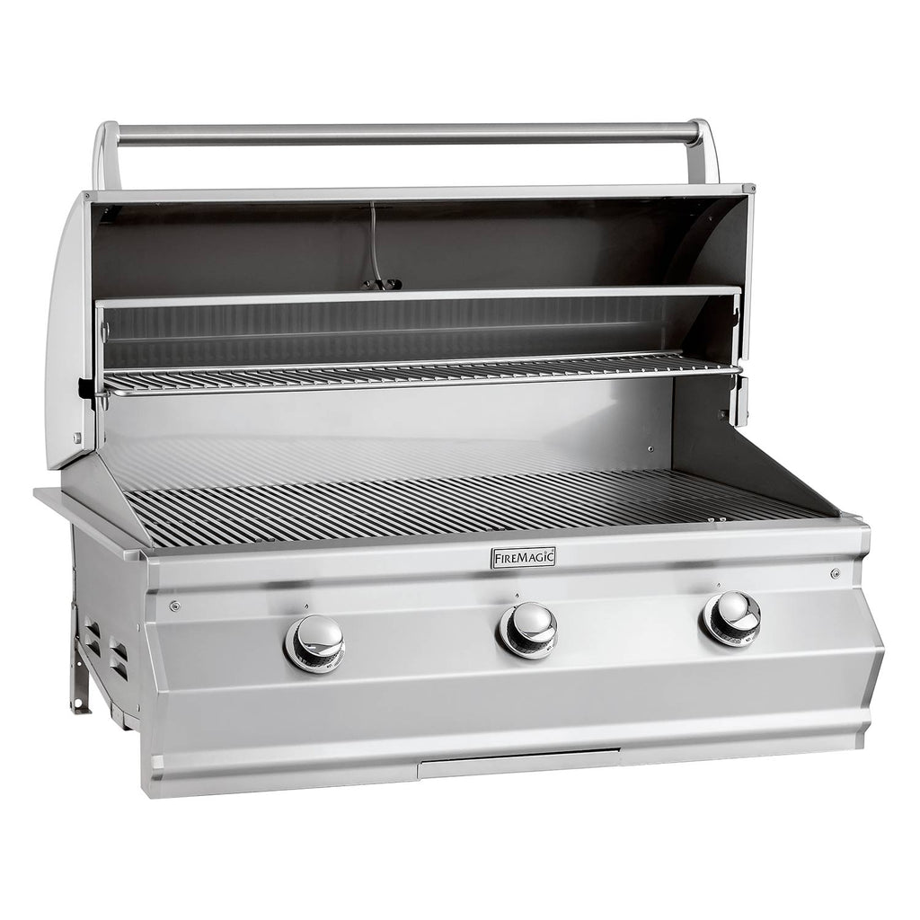 Built-in gas grill with open hood, stainless interior, cooking grates and warming rack