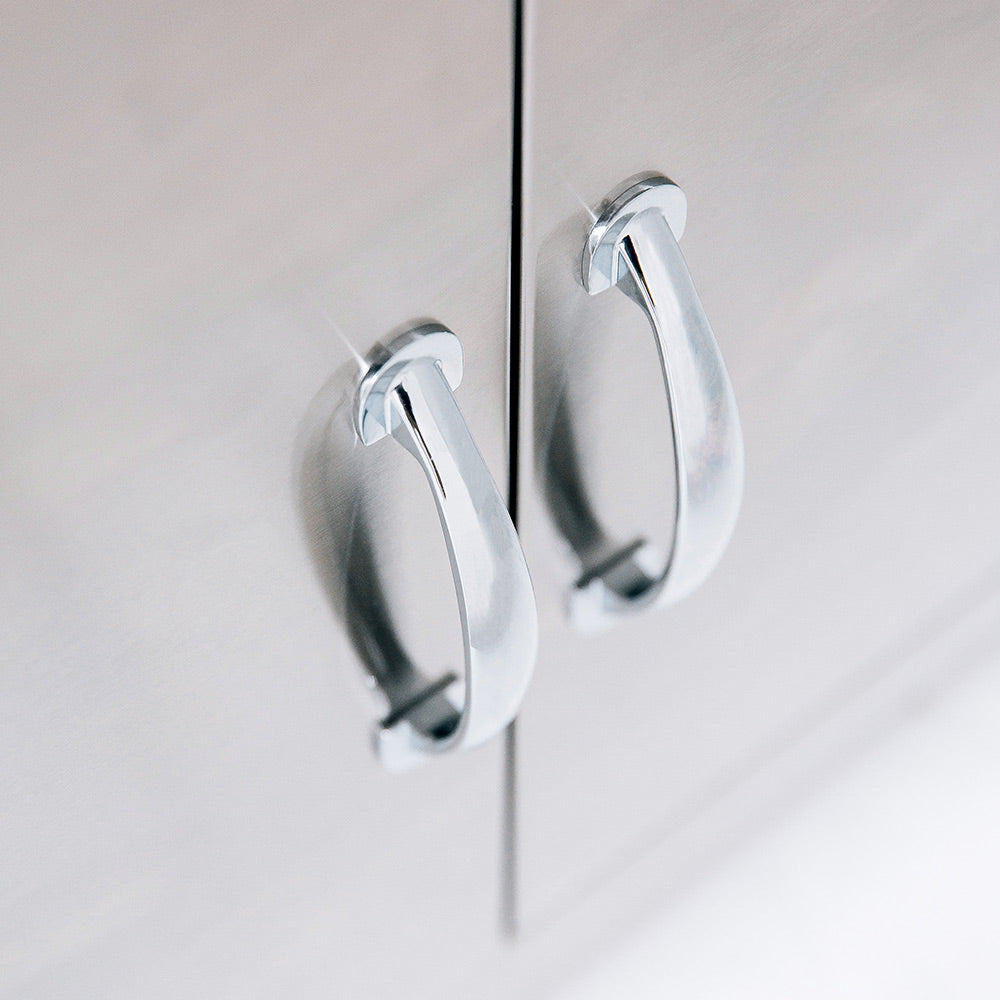Stainless steel cabinet handle with curved grip