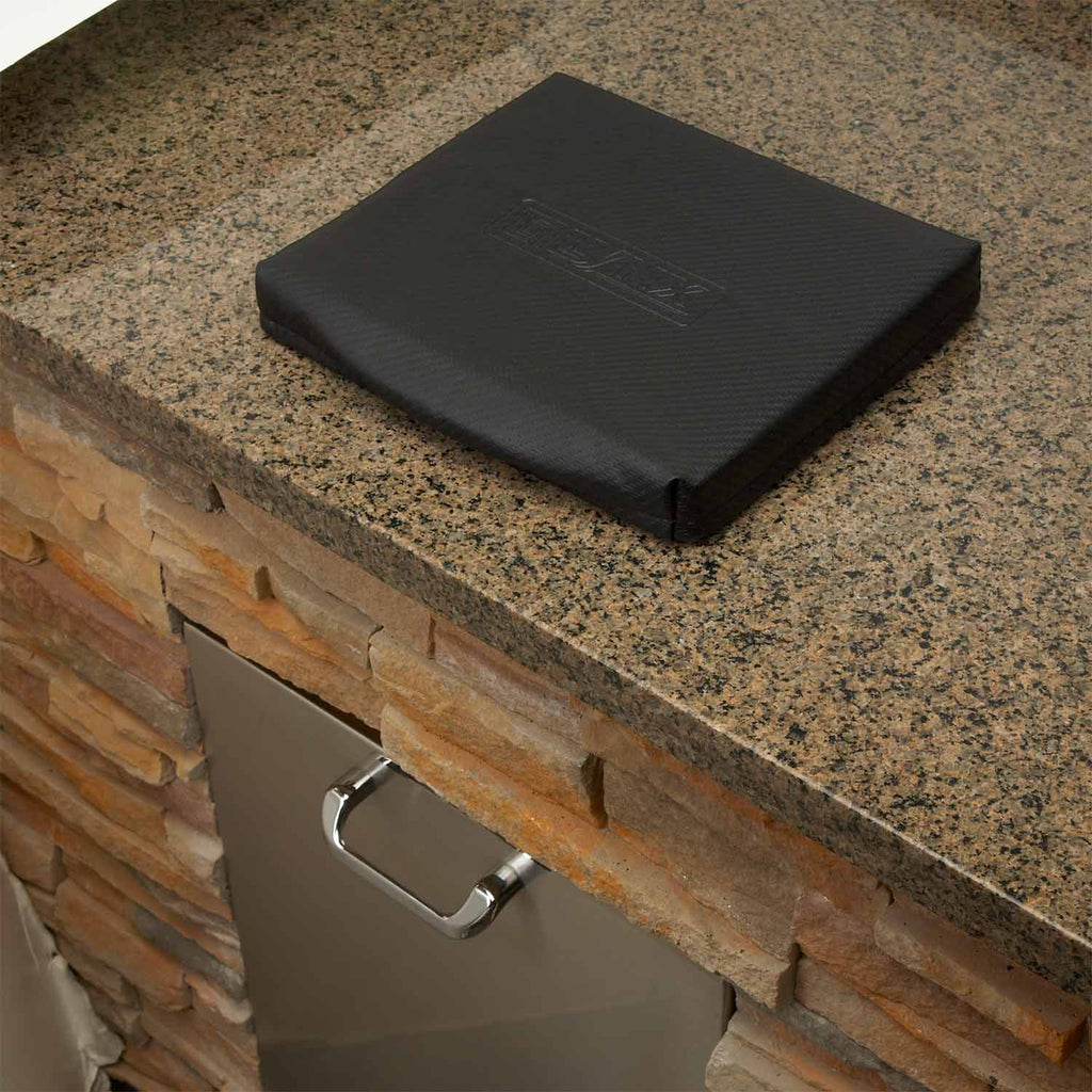 Carbon fiber vinyl trash chute cover, black square over chute opening