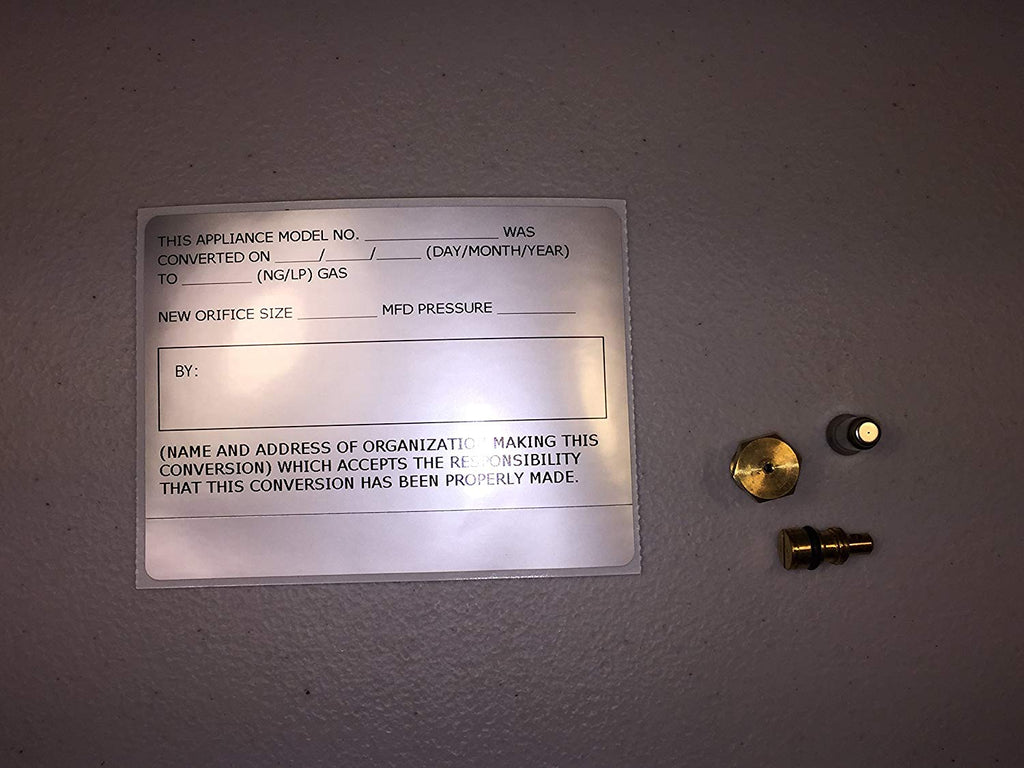 LP conversion kit with metal fittings and a brass-toned disk