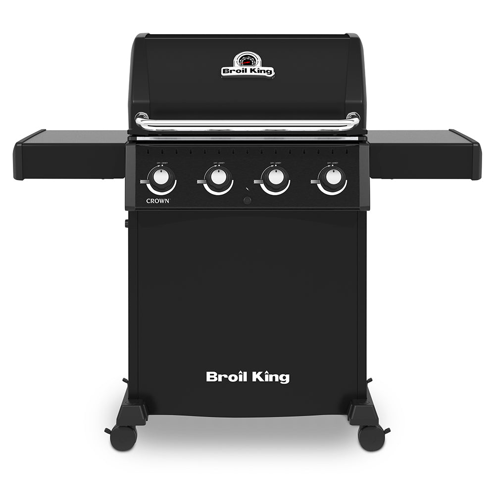 Broil King gas grill with four stainless control knobs and side shelves