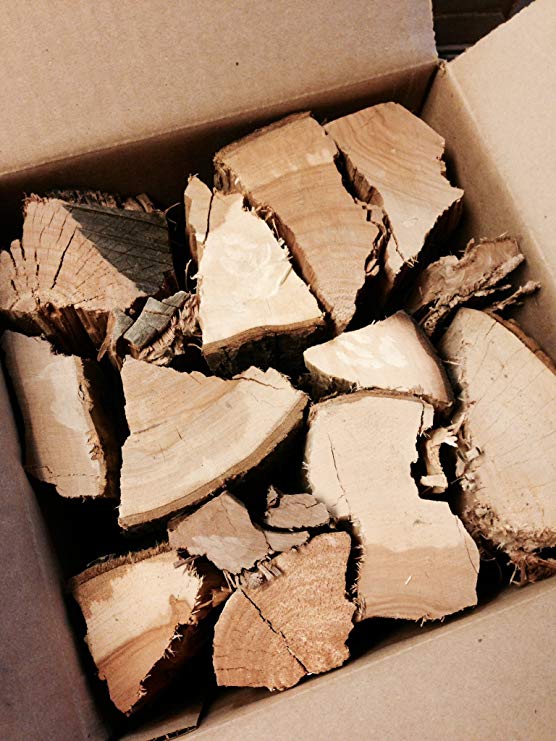 Alfa oak wood chunks in cardboard box, split log pieces