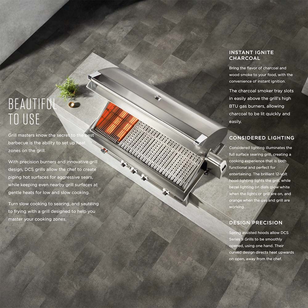 Open stainless gas grill with glowing infrared burner and warming grates