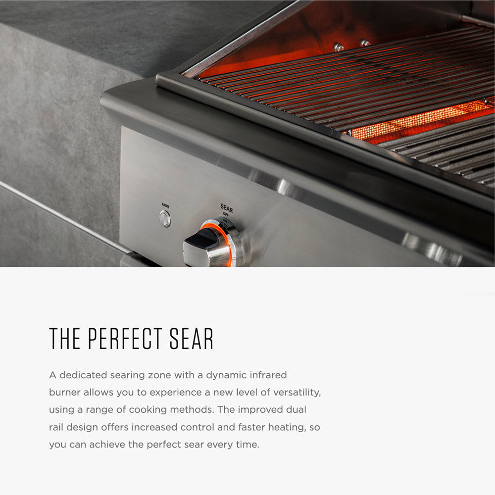 Stainless steel gas grill with glowing infrared sear bars above the grill grate
