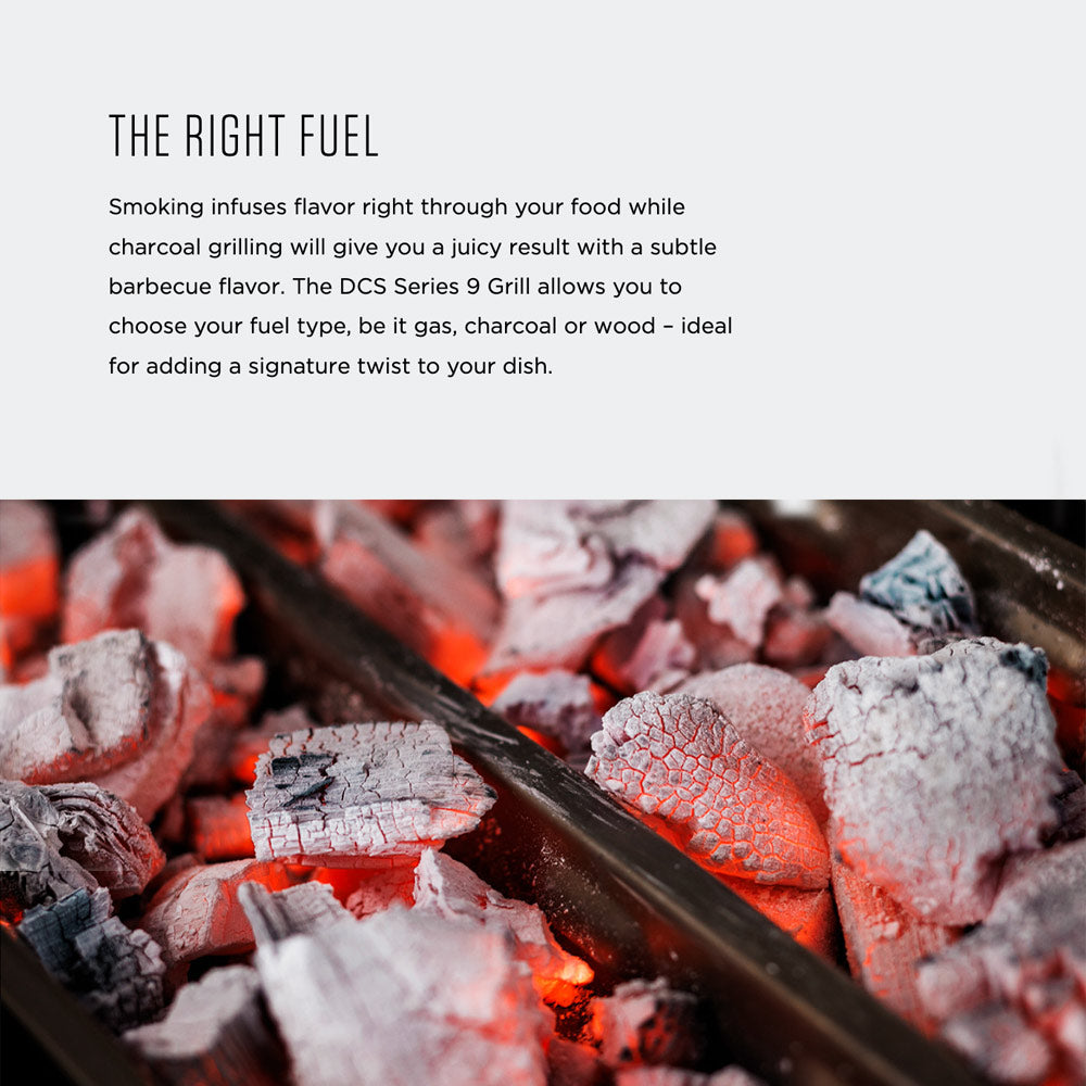 Gas grill firebox with glowing red-orange coals and ash-dusted logs