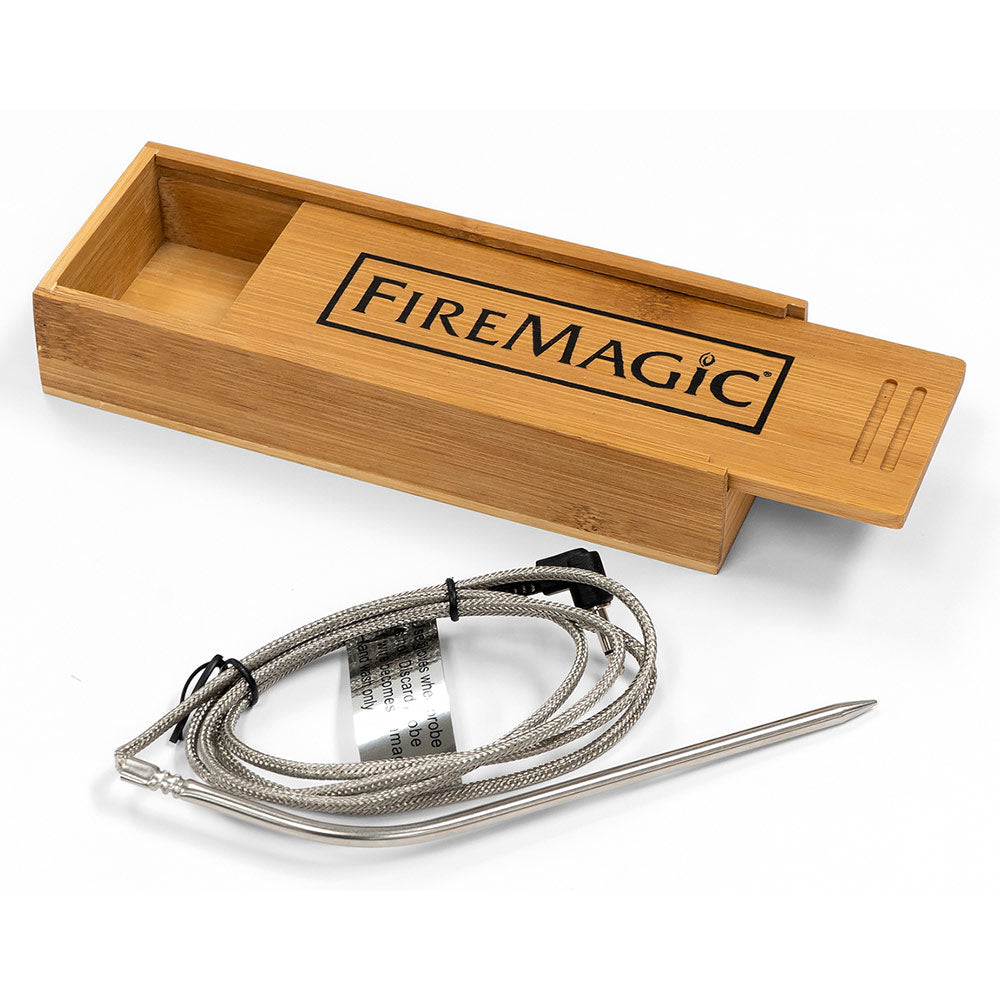 Fire Magic wooden storage box with “Fire Magic” logo, cord, and stainless tools