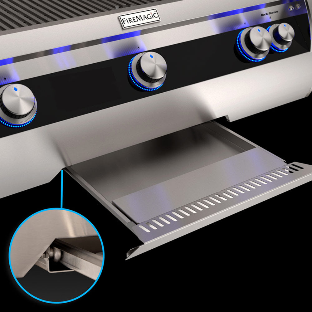 Stainless grill burner controls with blue LED rings and open side tray