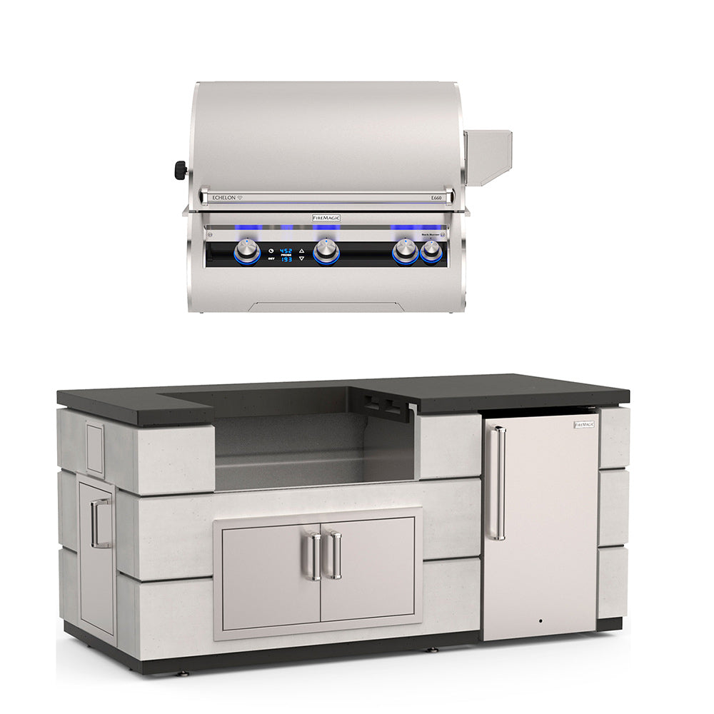 Fire Magic outdoor kitchen island with stainless grill, black countertop, and storage doors