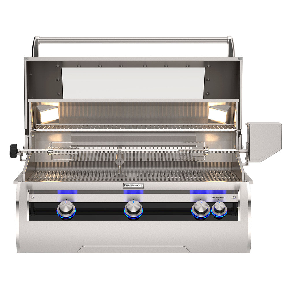 Stainless built-in gas grill with open hood, cooking grates, and front control panel