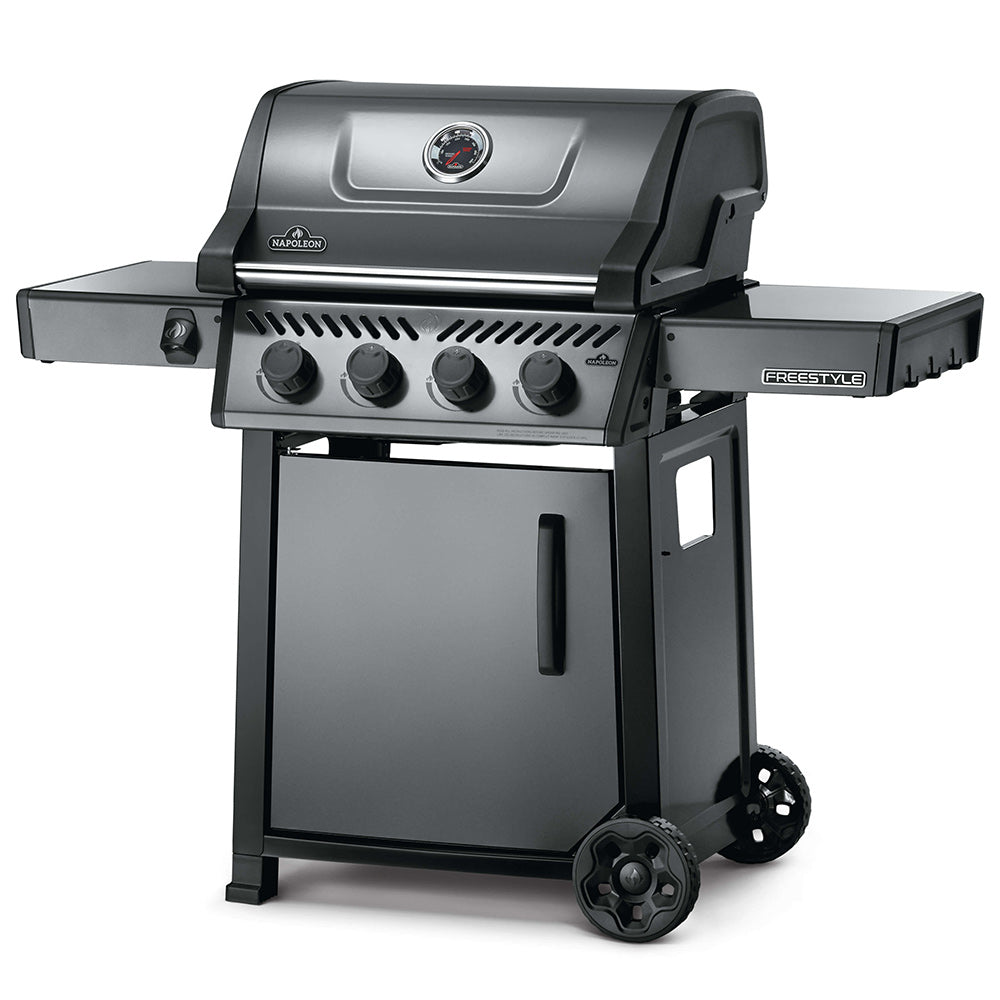 Freestyle gas grill on cart with side shelves and four burner control knobs, lid closed