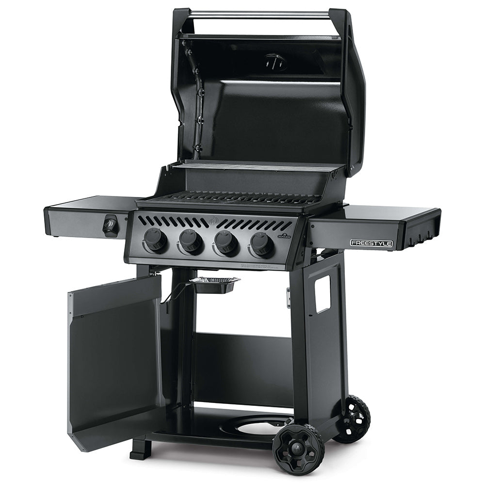 Freestyle gas grill on cart with open lid and four-burner cooktop