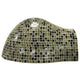 Glass tile pizza oven dome with copper mosaic grid pattern and central badge