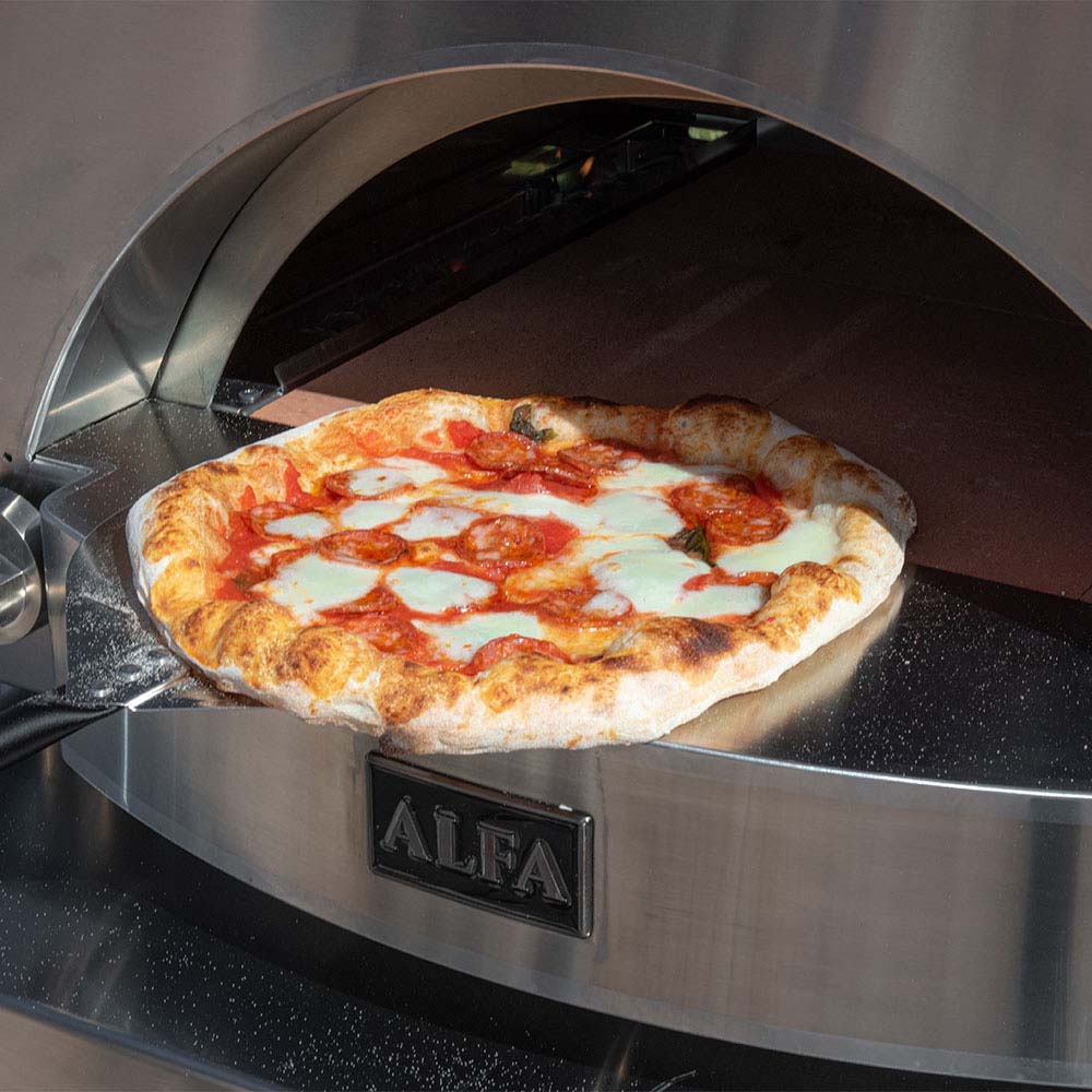 Alfa Classico 2 gas pizza oven, pizza inside the baking chamber on the stone base
