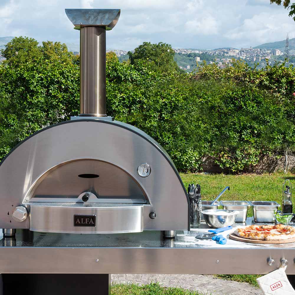 Alfa countertop gas pizza oven with domed front opening and chimney flue