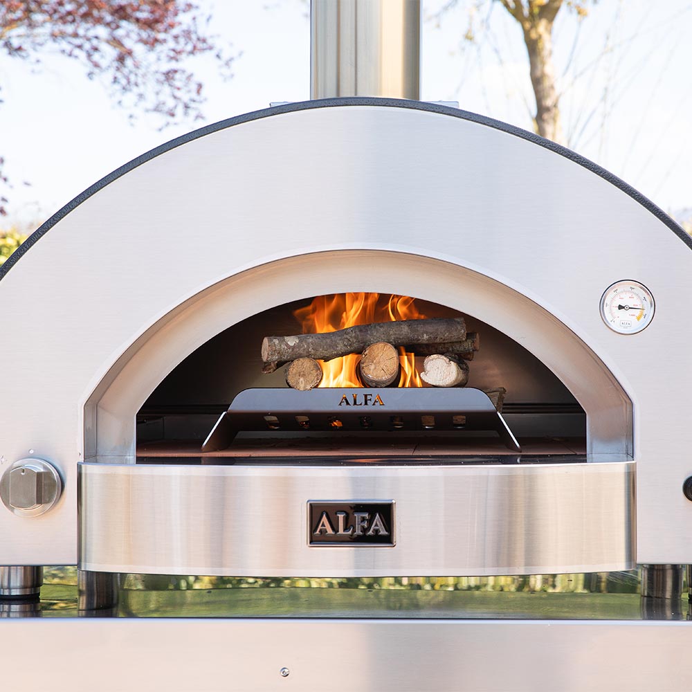 Alfa Classico wood-fired pizza oven mouth with flames inside and stainless front panel