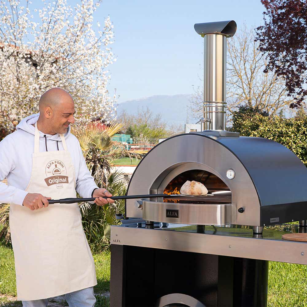 Alfa Classico 4 pizza oven with stainless firebox and dark hood, ready to bake