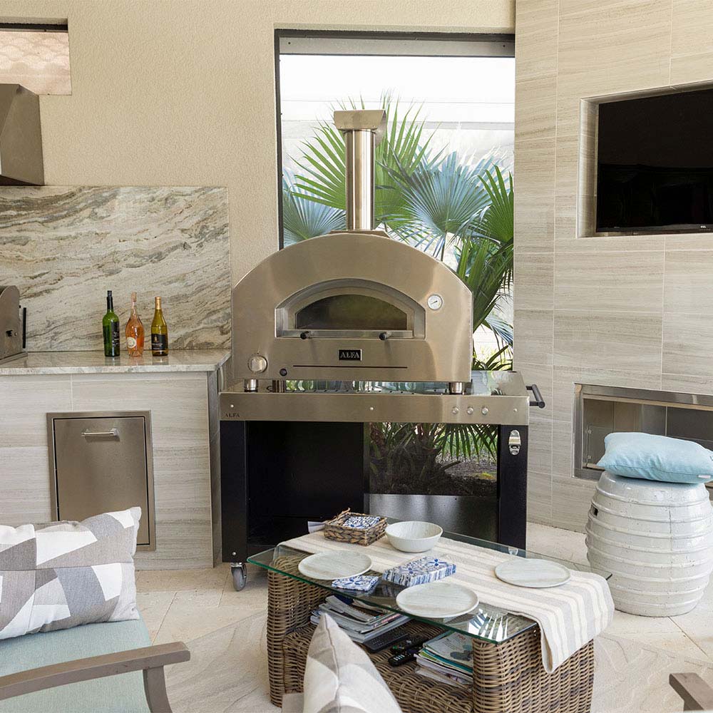 Countertop gas pizza oven with hooded dome and open front cooking chamber
