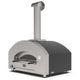 Countertop gas pizza oven with dark body panels, stainless flue, and arched doorway