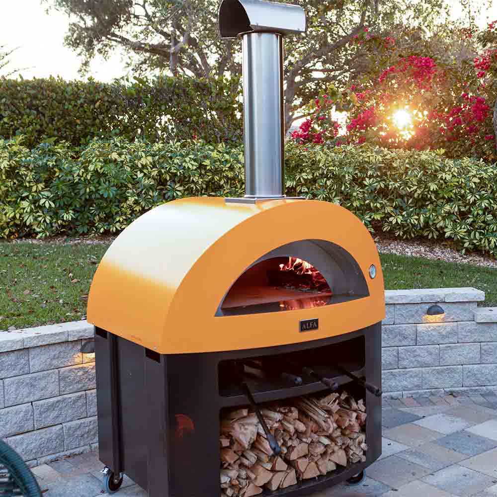 Freestanding wood-fired pizza oven with yellow dome and arched front firebox
