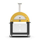 Yellow wood-fired pizza oven on wheels with arched front door and chimney