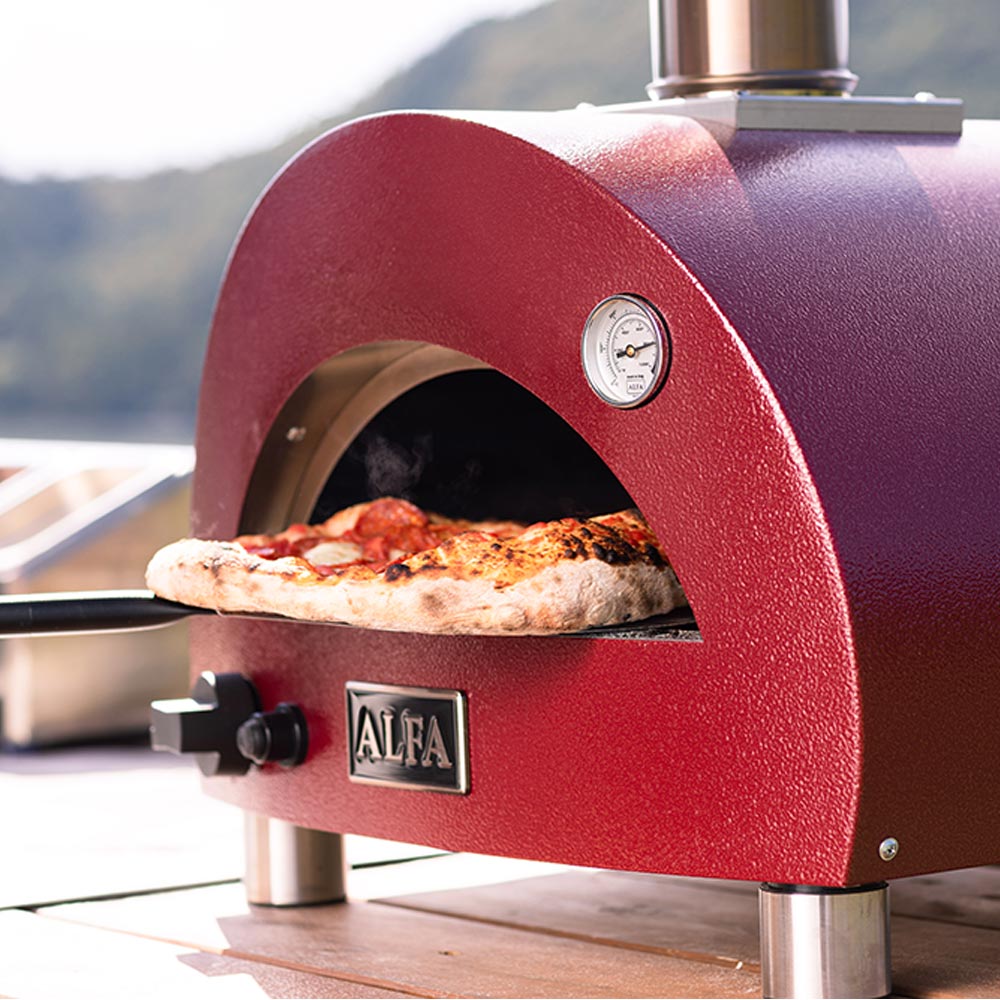 Red gas pizza oven with pizza baking inside and ALFA nameplate