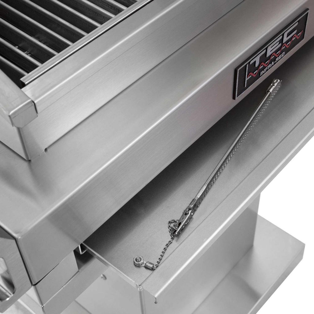 Stainless steel grill lid area with logo badge and control panel detail