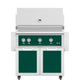 Freestanding gas grill with two cabinet doors and control panel, deep green finish.