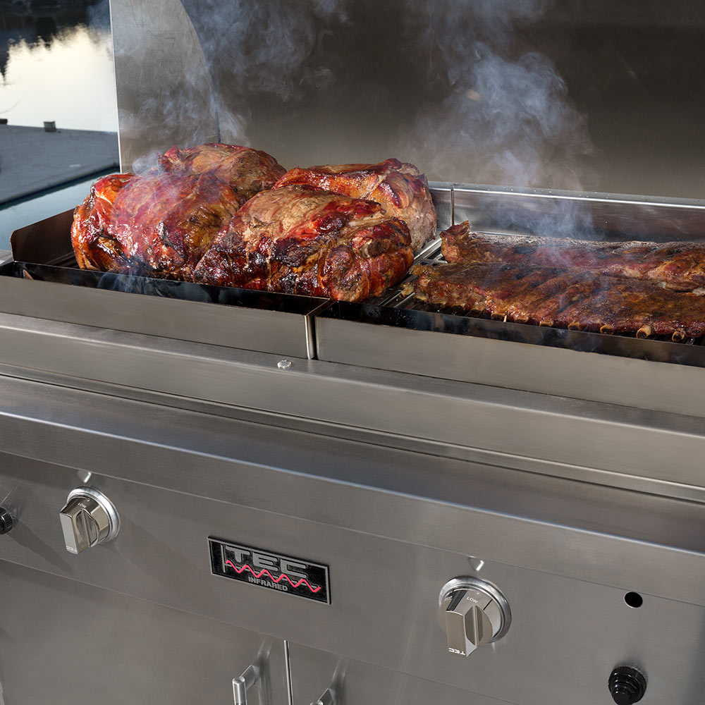 Stainless steel patio grill rack with TEC logo, control knobs, and open flame box