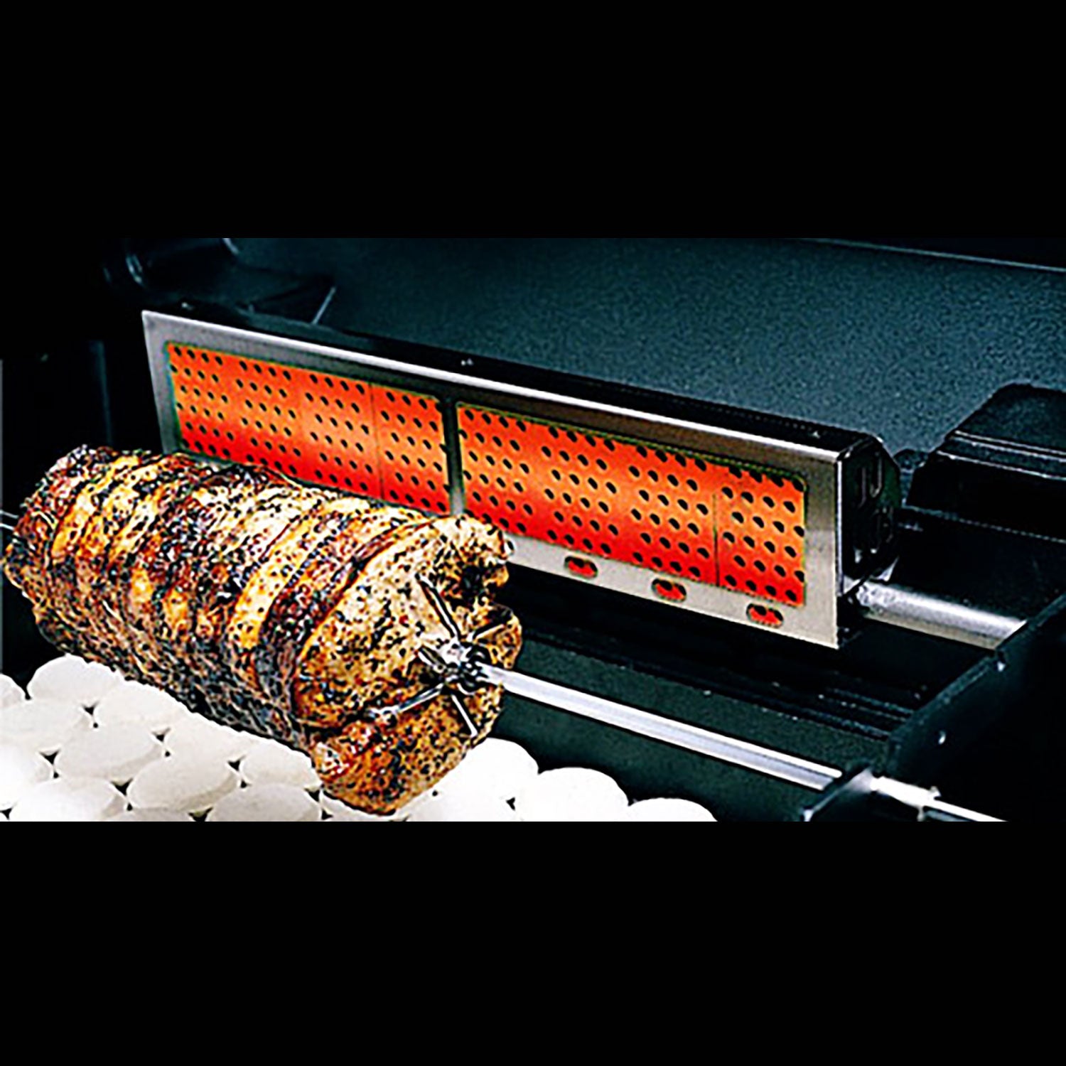 Infrared rotisserie burner with perforated heat shield and rotisserie spit, for grilling