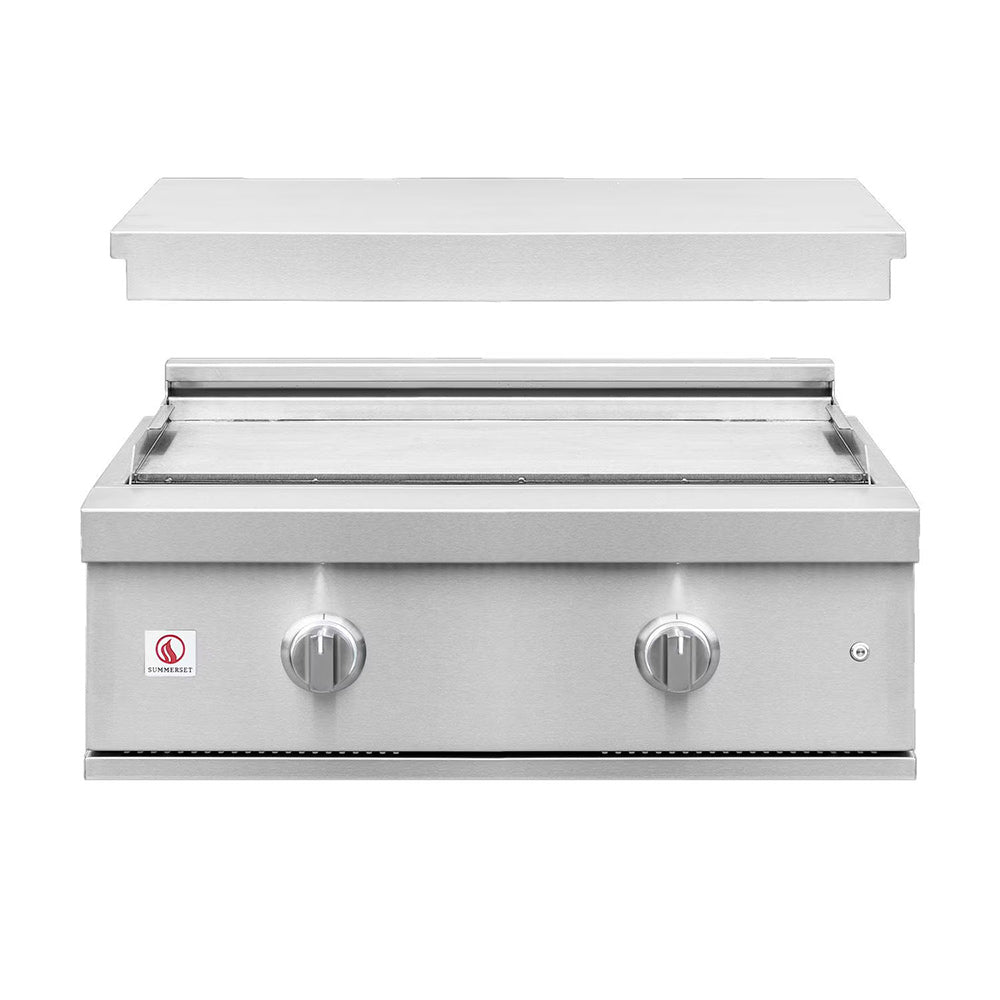 Built-in gas griddle with lid closed and two front control knobs on stainless body