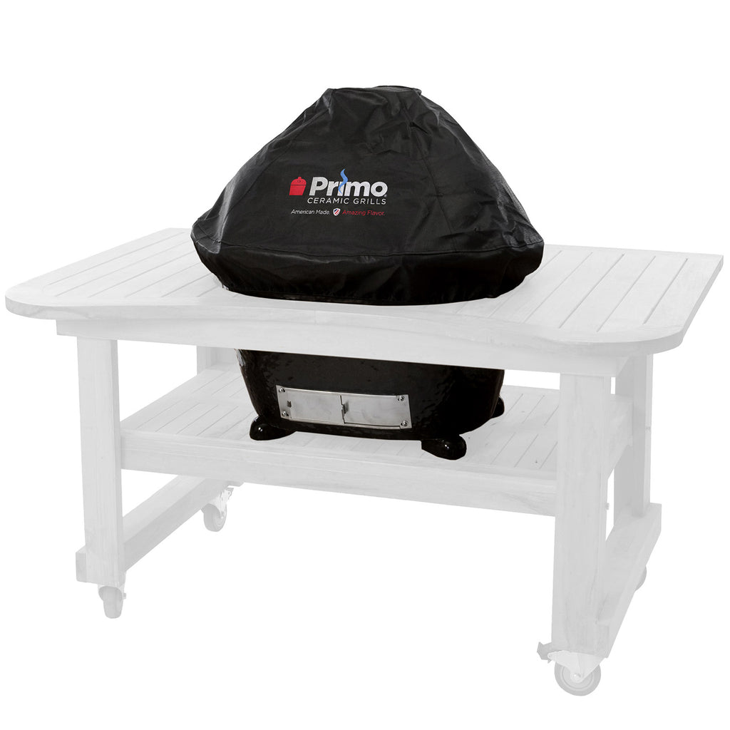 Black vinyl grill cover with Primo logo, fitted over an oval built-in grill