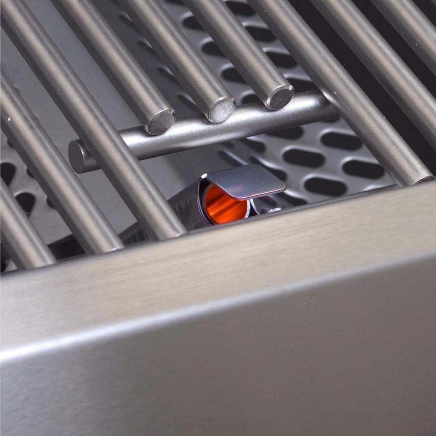 Stainless steel burner tubes beneath the grill grate with a visible ignition outlet